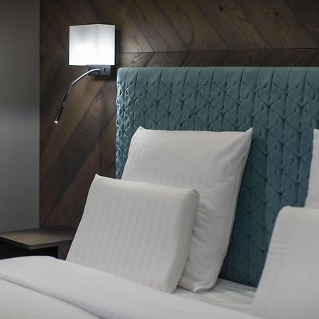 Pullman Riga Old Town Exterior foto A bed with a headboard