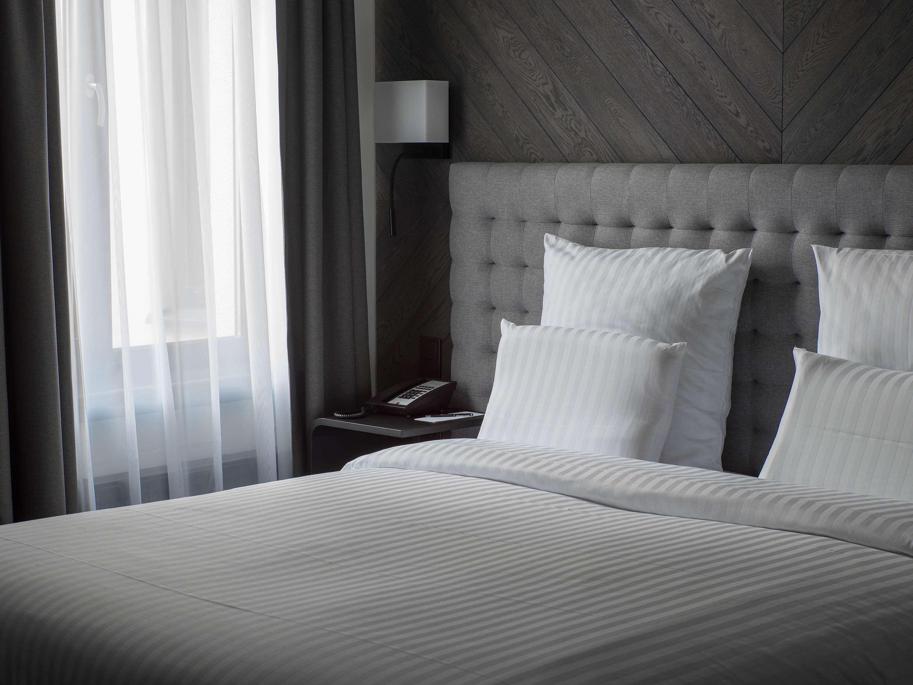 Pullman Riga Old Town Exterior foto A bed with white sheets