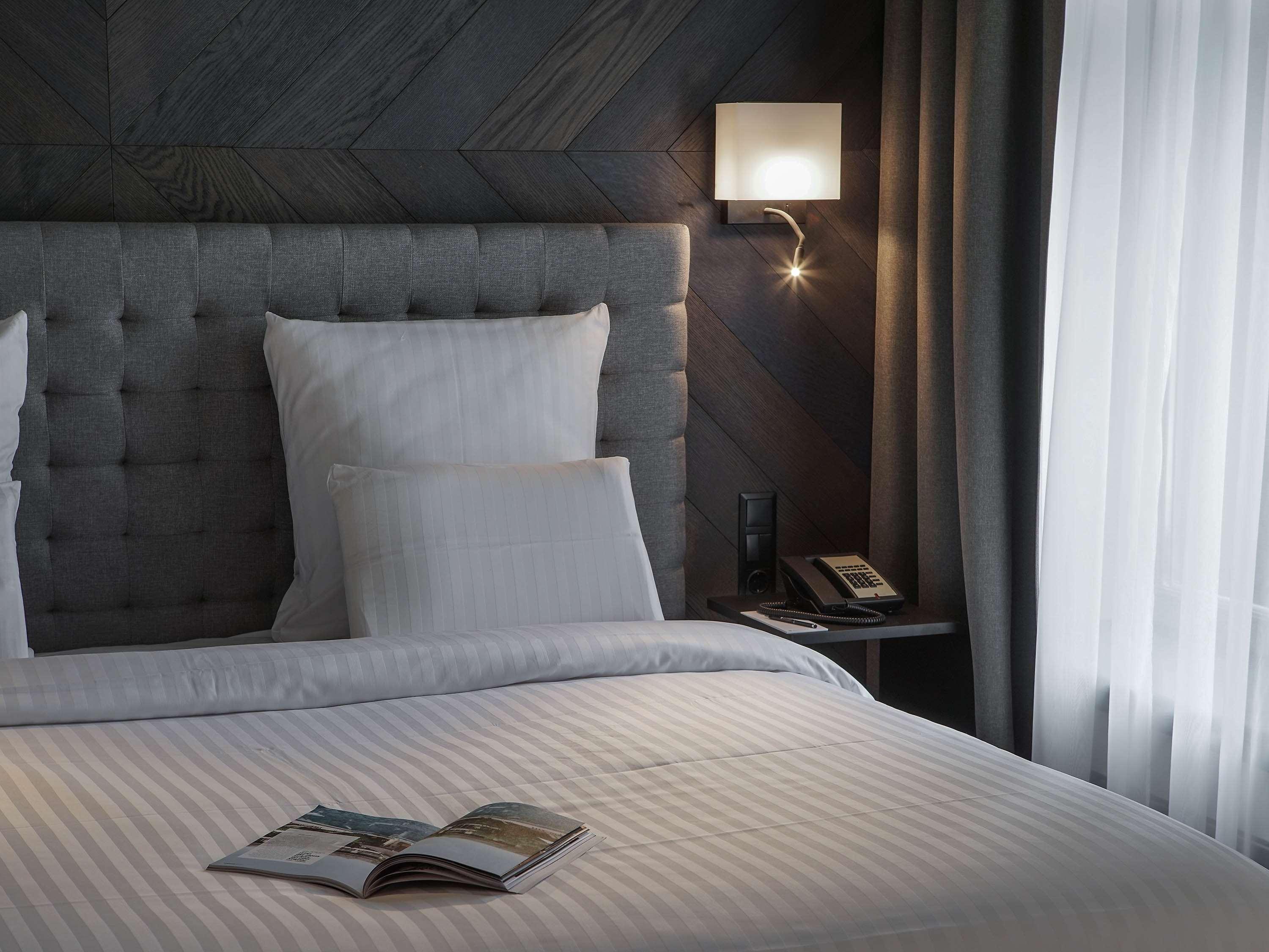 Pullman Riga Old Town Exterior foto A bedroom at the hotel