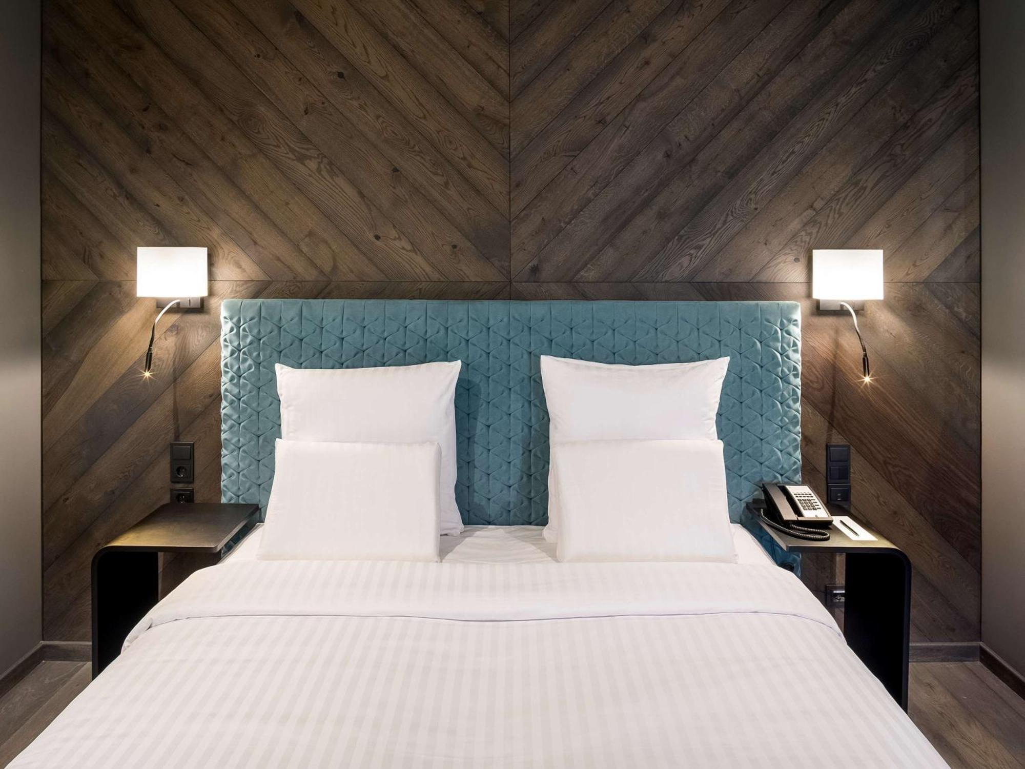 Pullman Riga Old Town Exterior foto A bedroom at the hotel